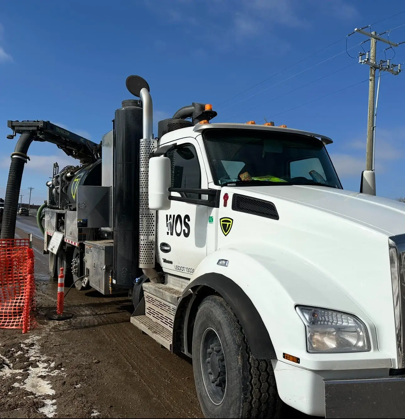 Front view of Well Oiled Solutions hydrovac truck