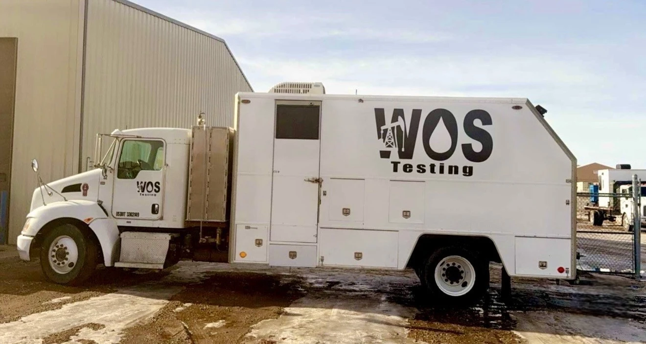 WOS Testing pressure-test command unit truck staged at the Williston shop