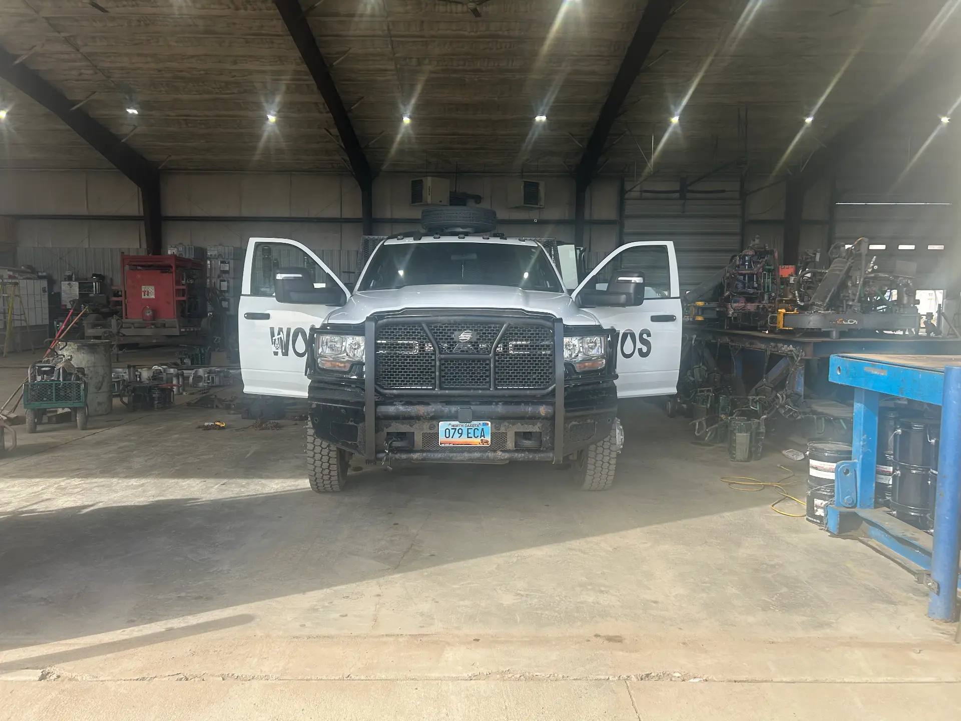 Well Oiled Solutions service truck inside the Williston shop
